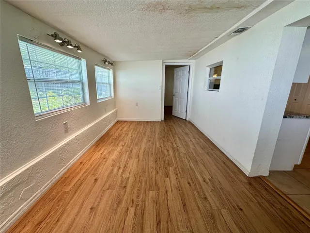 Family Room, door leading into Primary Bed/Bath