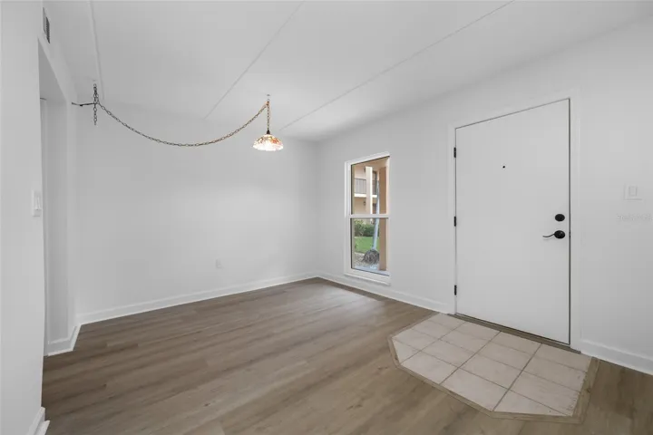 Entrance to condo with dining area