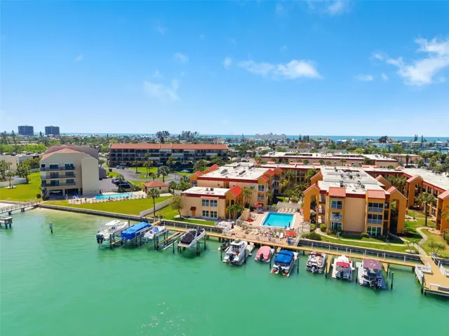 vVIEW OF POOL, SUNDECK AND BOAT SLIPS