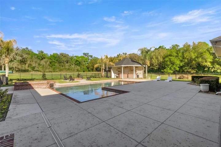 Pool with space and cabana view