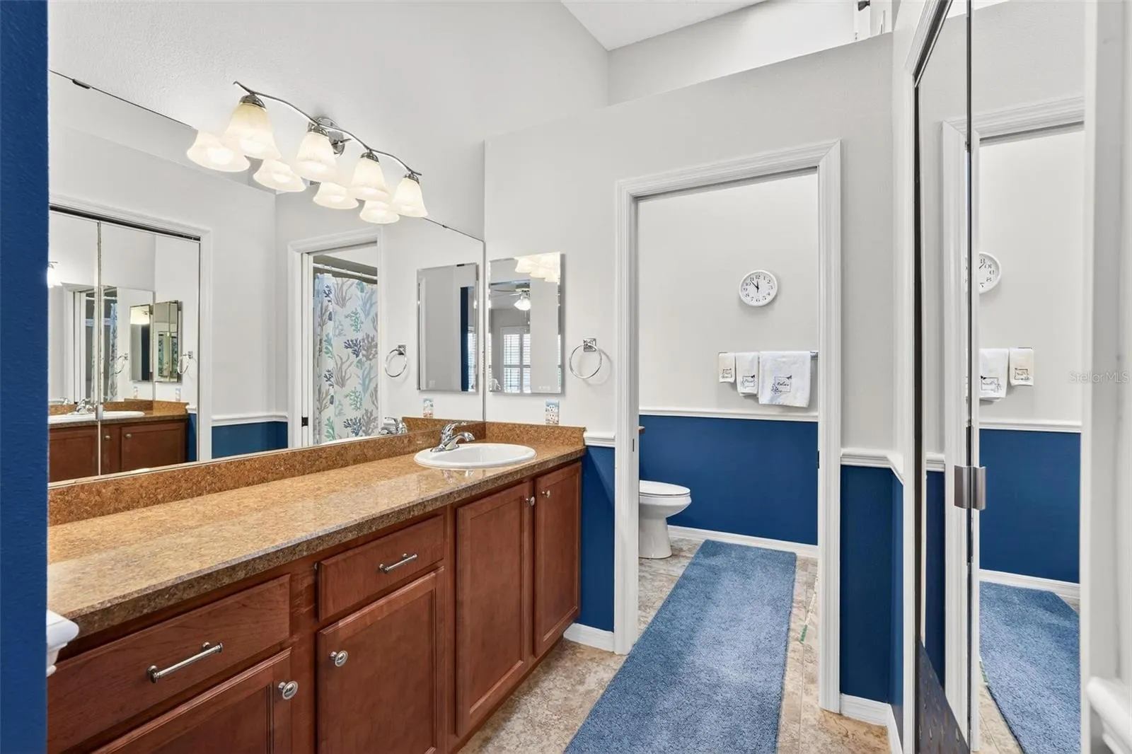 Oversized vanity with newer countertops