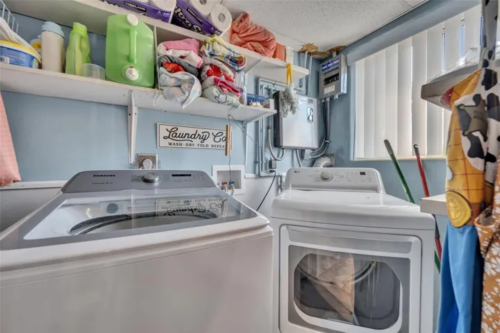 Laundry room off of kitchen.