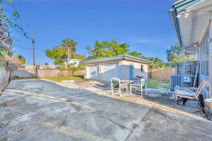 Oversized RV parking pad, extended for 40 ft RV, 50 amp hook up. Boat parking, can fit 8 cars.