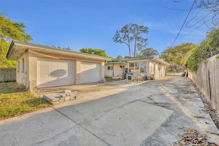 Detached garage with 50-amp hook up RV parking, boat parking, golf cart parking, and more.