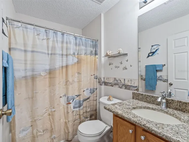 2nd Bathroom with Granite countertop and shower tub combo