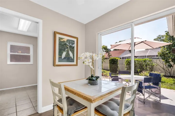 Opens to the large indoor laundry room with convenient garage access~