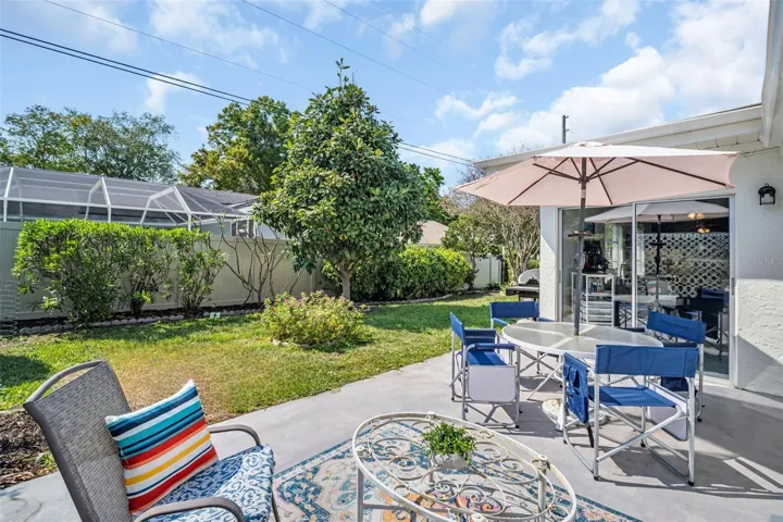 Private back patio for outdoor furniture & grill~