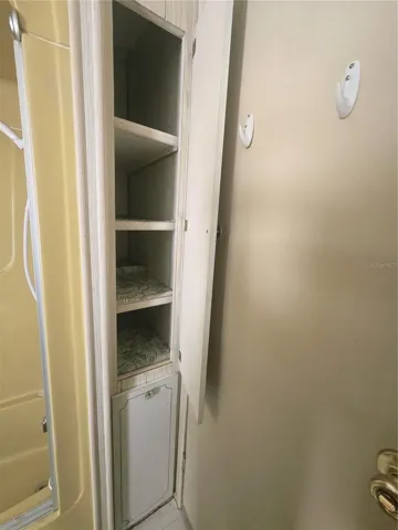 Guest bath linen closet & clothes hamper
