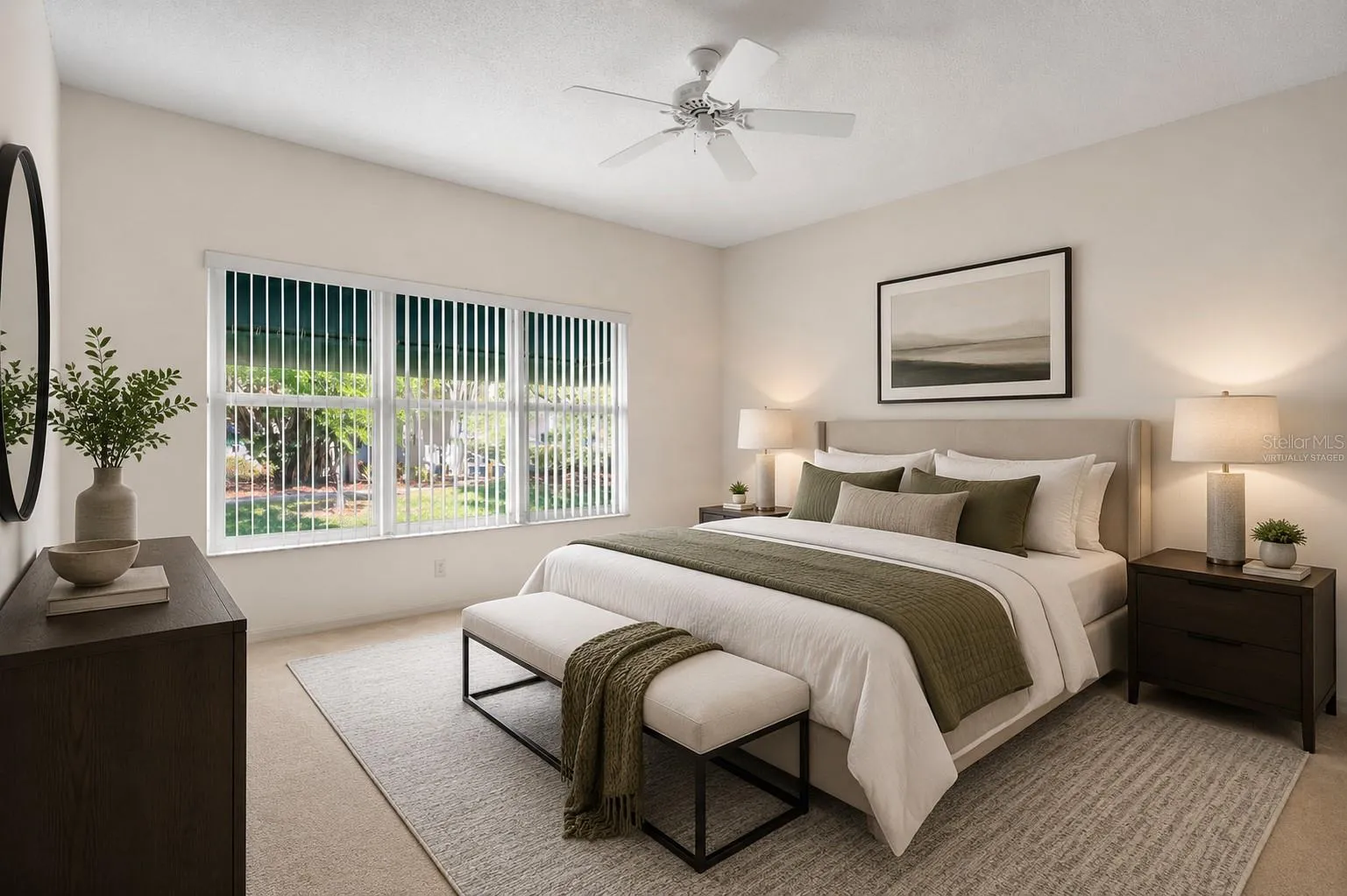 Generously sized primary bedroom with ample wall space for a full furniture layout and flexibility in room design. This photo has been virtually staged.