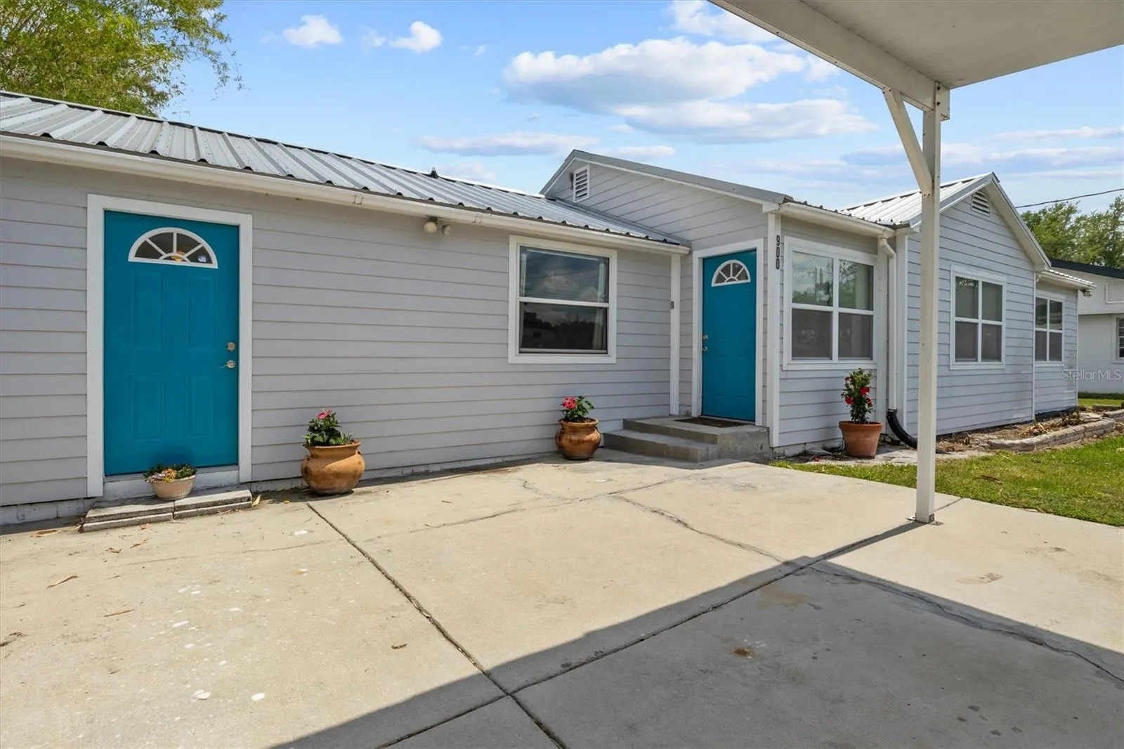 Front exterior, plenty of parking space