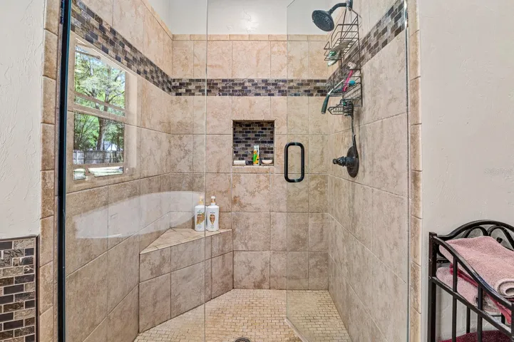 Glass shower with seat