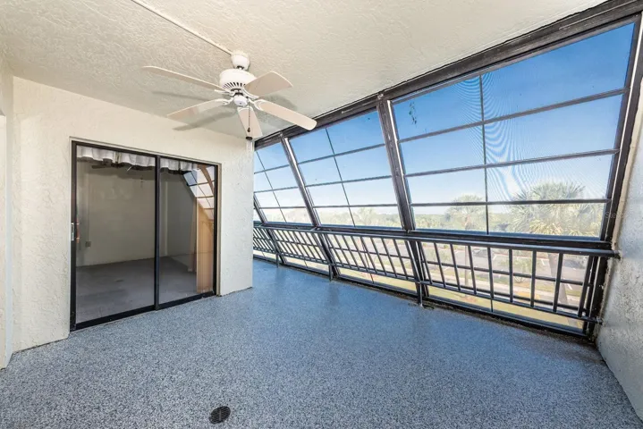 Balcony, primary bedroom slider doors to balcony