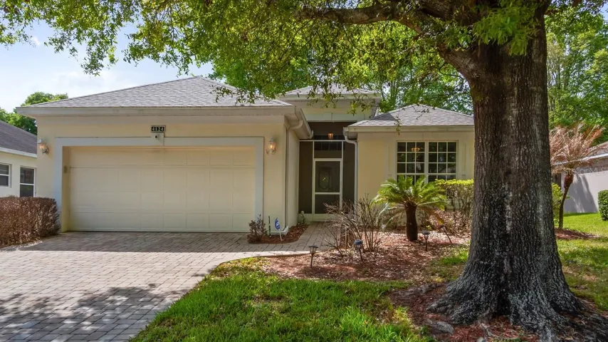Front With Paver Driveway and Walkway
