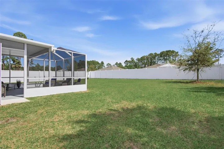 Spacious yard with Vinyl fence