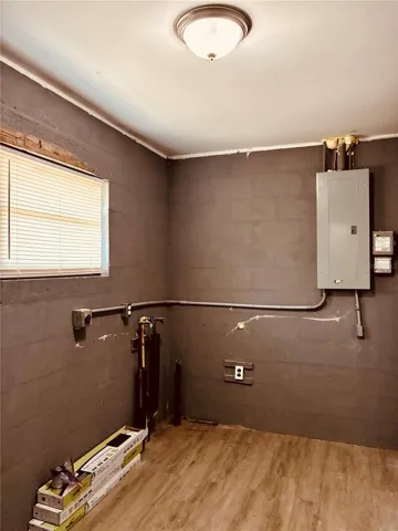 Laundry room next to the kitchen