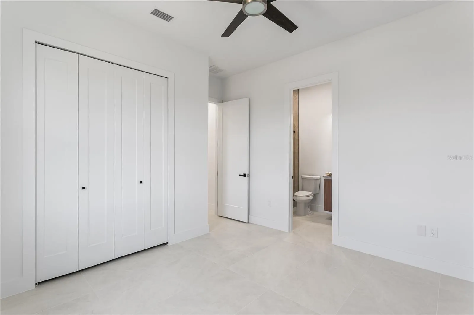 SPLIT FLOOR PLAN PROVIDES privacy w/ a SECOND ENSUITE BEDROOM, 3RD GUEST BEDROOM & ADDITIONAL 3RD BATHROOM in the hallway.