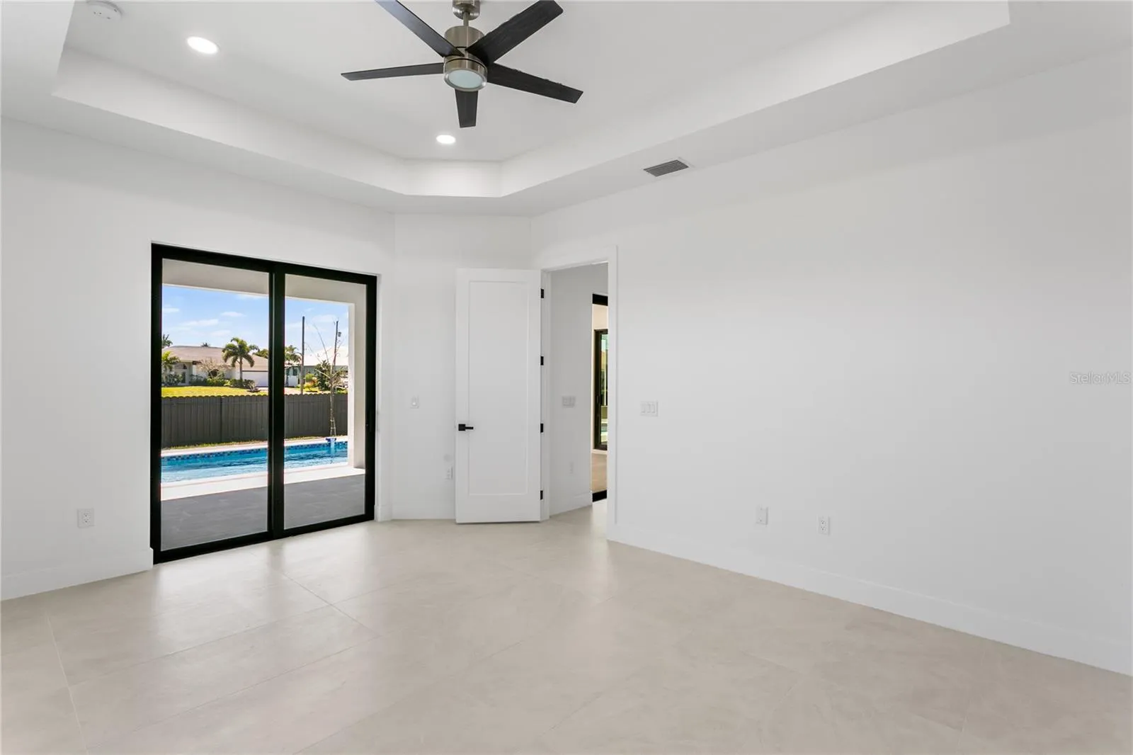 The PRIMARY SUITE is a TRUE RETREAT w/ TWO WALK-IN CLOSETS