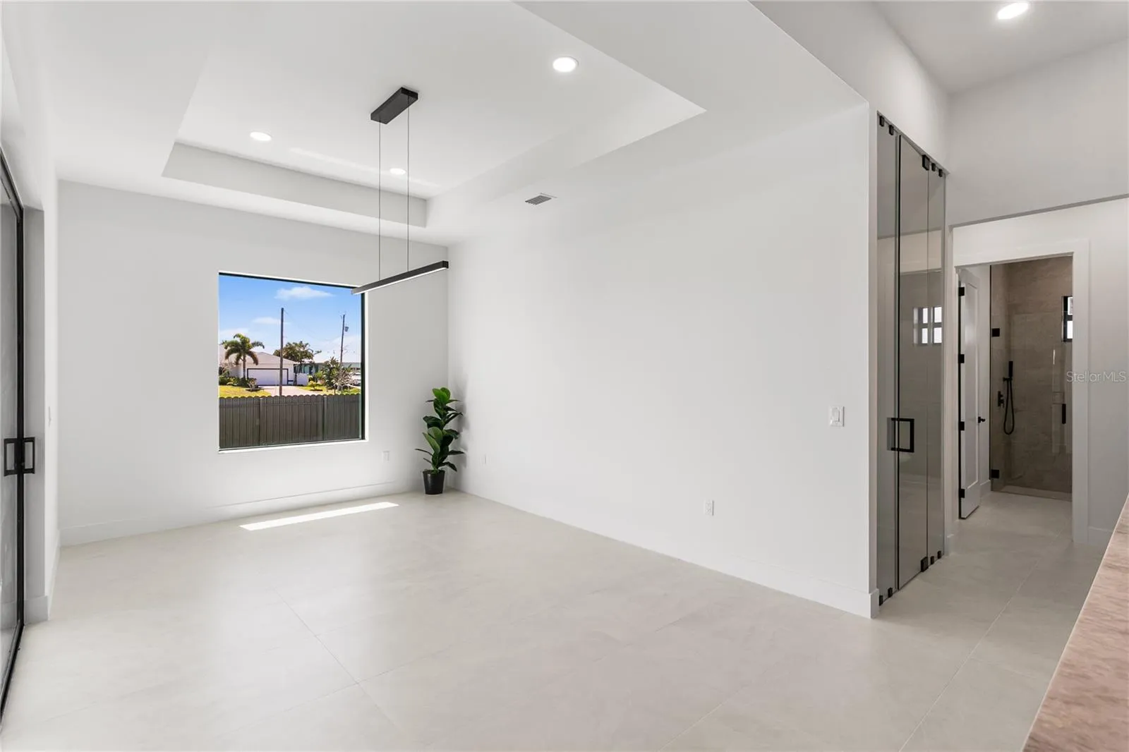 The FORMAL DINING AREA showcases a LARGE PICTURE WINDOW