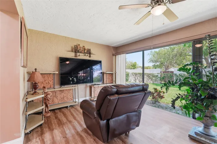 Florida room provides plenty of light infused living space