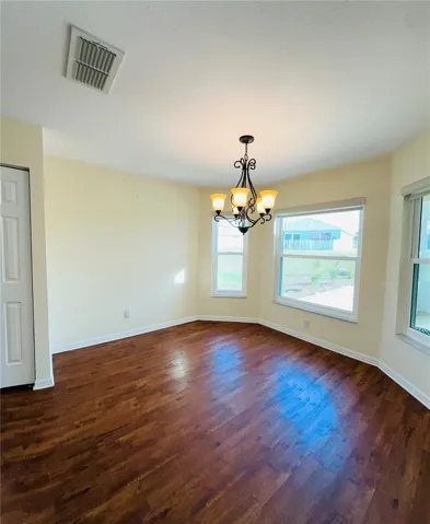 DINING ROOM WITH BAY WINDOW