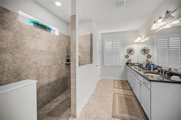 Primary bath with large walk in shower