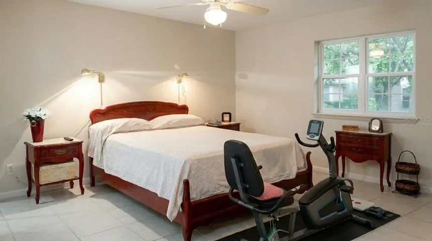 Retreat to the spacious, virtually staged primary bedroom, offering a serene atmosphere, ample natural light, and plenty of room to unwind.