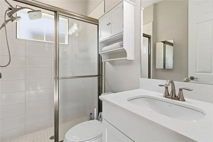 Main Level & Guest or In-Law Suite Full Bath & Separate Entrance to House off the Backyard