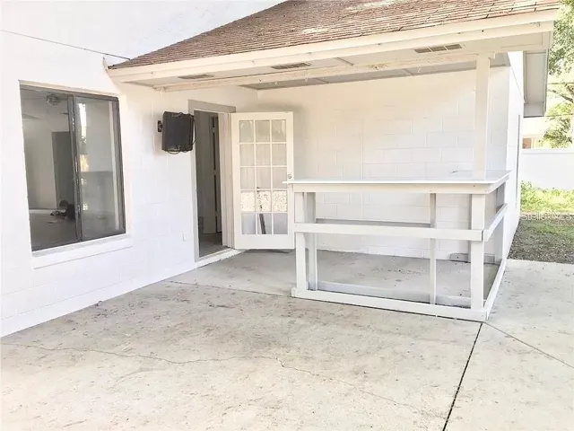 Built-in wood bar in covered patio