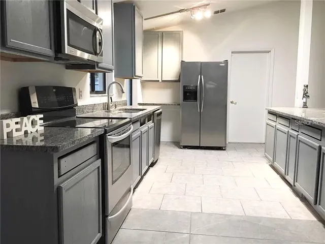 Spacious and airy, w/ built-in desk near fridge