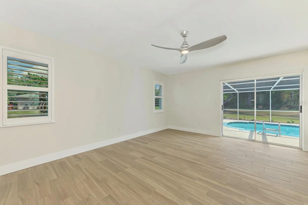 Third Bedroom with large slider out to pool