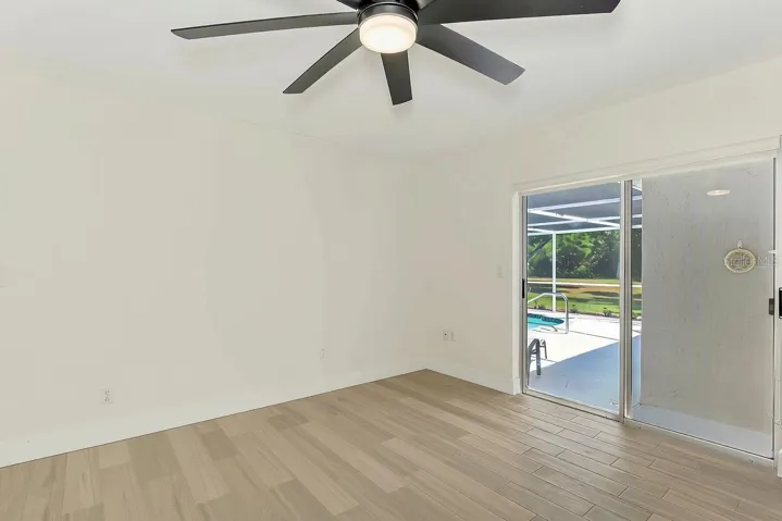 Primary with sliders out to pool
