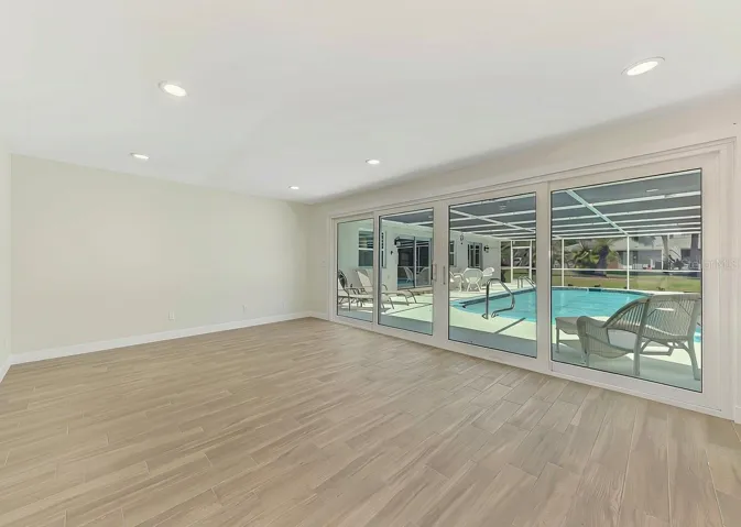 Inside the pool house.  Endless possibilities! Hurricane Rated Sliders too!