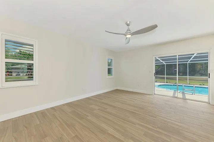 Third Bedroom with large slider out to pool