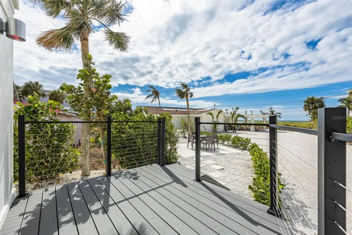 Unit A deck looking toward unit B and Beach