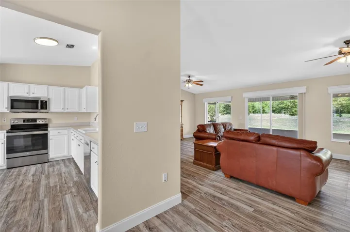 Foyer opening to Kitchen Left- Living area/Dining straight