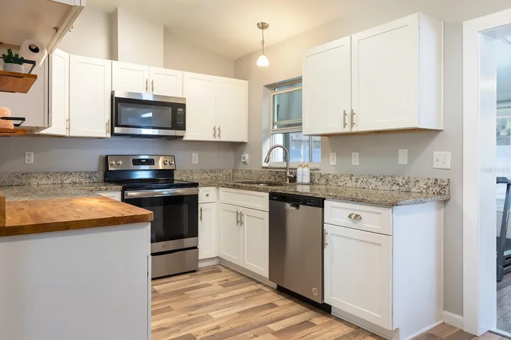 Updated kitchen, granite and stainless appliances