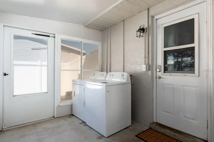 Laundry room, entrance to in law suite