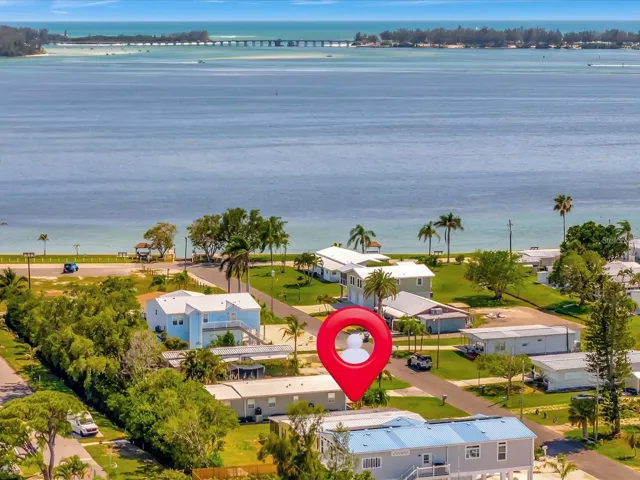 Trailer has been removed , Lot ready for New Build . View of Lot and Longboat Key Pass. Gulf Access in 7 Mins
