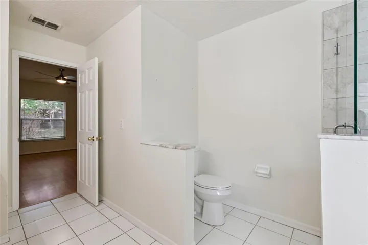 Primary Bathroom Commode (Downstairs)