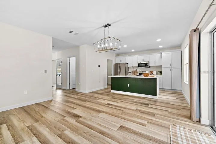 The Kitchen overlooks the large Living Room.