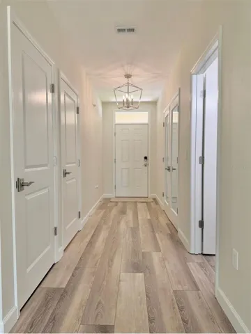 The bonus room and half bathroom are on the right side, and the garage and a walk-in closet is on the left.