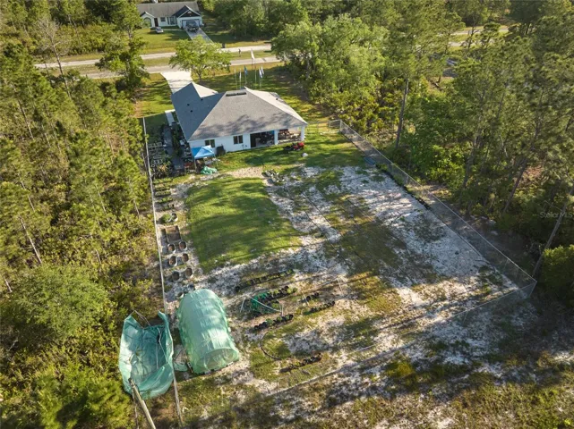 DRONE VIEW FROM THE BACK OF HOUSE