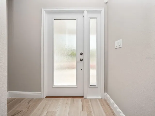 Step inside and this room leads to a spacious office/bedroom with plenty of storage