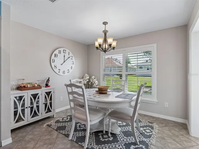 Eat in Area of Kitchen w/Plantation shutters & access to Lanai