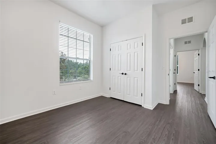 25.Montes-6265 Contessa Dr Unit 303-1st BR Facing Towards Closet