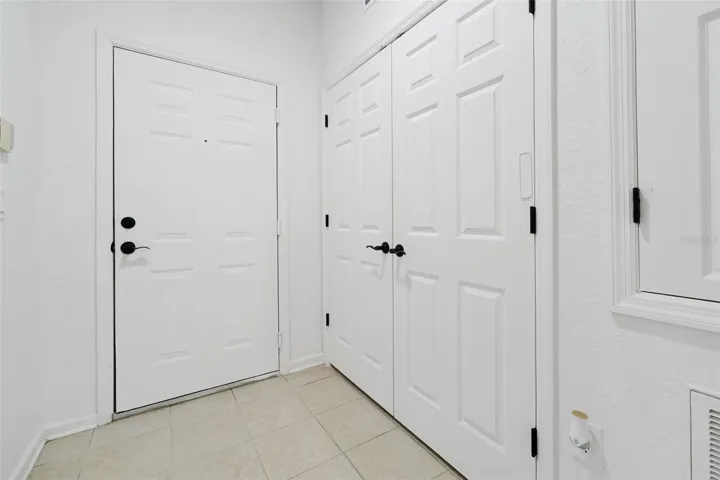 18.Montes-6265 Contessa Dr Unit 303-Entry Toward Exit