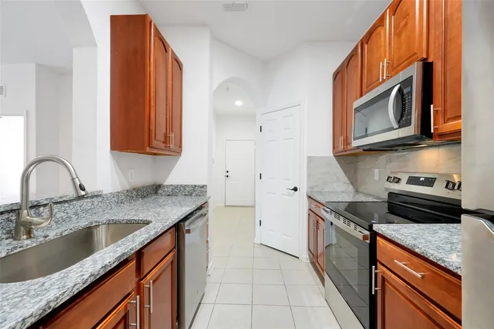 14.Montes-6265 Contessa Dr Unit 303-Kitchen Towards Front