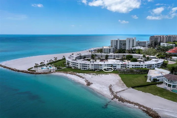 Welcome to Sands Point! Tucked away in an incredible location behind the gates of Longboat Key Club. This 2 bedroom/2 bath walk out invites you to live in a resort-like community every day!