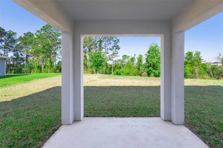Lanai with views of the lake and lake treeline