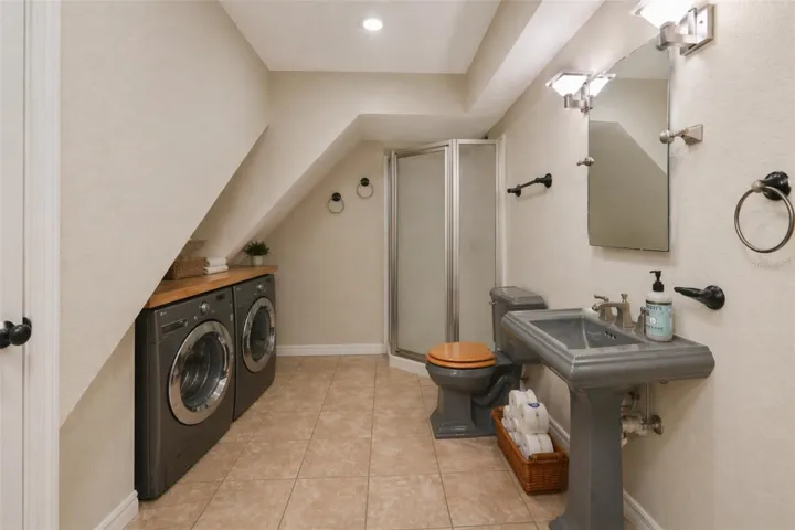 Virtual rehab flipping washer and dryer from garage to bathroom